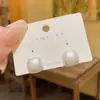 Pendientes Vintage Festivos Geométricos Cuadrados Pequeños de Perla 2026 Nuevos Pendientes de Celebridad de Internet de Moda Accesorios Versátiles para Orejas de Lujo Ligero