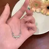 Pulsera Extraíble de Zirconia con Lazo de Lujo Ligero para Niñas, Accesorios de Diseño de Nicho Ins, Nueva Joyería de Mano Estilo 2025