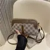 Bolsa Feminina 2026 Nova Bolsa de Concha de Verão Estilo Coreano Bolsa de Ombro Simples Porta-moedas Bolsa Transversal Pequena Estilosa
