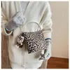 Bolso de mano súper popular de nicho con estampado de leopardo para mujer en otoño e invierno, nuevo bolso cruzado retro 2026, moderno bolso de hombro único tipo cubo