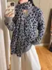 Suéter retro coreano con estampado de leopardo para mujer, nuevo estilo de moda otoño e invierno 2026, tejido casual de punto suelto, bufanda versátil