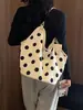 Bolso de axila de nicho de alta gama para mujer, bolso tipo cubo con estampado de lunares nuevo 2026, bolso de hombro de gran capacidad