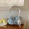 Bolso Cubo de Hombro Cruzado de Gama Alta Versátil para Viajes Diarios Verano 2026 Nuevo Exquisito Moda Nicho Diseño de Un Solo Hombro Debajo del Brazo