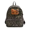 Nova mochila de pelúcia Hello Kitty com estampa de leopardo 2026, estilo coreano, fofa, de grande capacidade, bolsa escolar casual para meninas