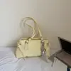 Bolso de hombro de lunares estilo coreano para mujer, nuevo bolso de moda para el hombro primavera 2026, bolso tote de mano de nicho de moda