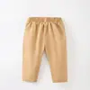 Calça Infantil Transfronteiriça Europeia e Americana Primavera e Outono Casual para Meninos e Meninas Calça Esportiva Elástica Calça Infantil Fofa para Bebês Liquidação