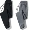 Calças Casuais Masculinas Primavera Outono Inverno Calças Esportivas Engrossadas Calças Skinny Largas Tamanho Plus Calças Longas de Cor Sólida