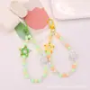 Novo Pingente Chaveiro Estrela de Cinco Pontas em Acrílico Pintado Acessório Criativo com Corrente de Contas Coloridas Decoração para Capa de Fone de Ouvido