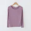 Nueva camisa base de algodón de color liso con cuello redondo y manga larga, estilo coreano para otoño, corte holgado, talla grande, top casual versátil para mujer