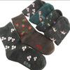 Venta al por mayor de fábrica de calcetines de lana de otoño e invierno, calcetines de algodón para mujer en el tubo, calcetines casuales gruesos y cálidos, suministro de mercado nocturno