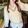 Chaleco de punto de cuello en V con bloques de color estilo universitario, nuevo para primavera y otoño 2026, estilo coreano, para mujer para usar como prenda exterior.