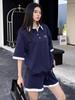 Conjunto deportivo informal de estilo universitario para mujer, conjunto de dos piezas de pantalones cortos holgados de manga corta estilo coreano de verano con estilo de sal de calle.