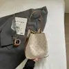 Bolsa feminina elegante e versátil estilo balde, novo modelo 2026, bolsa de ombro requintada para o dia a dia, bolsa transversal moderna e simples