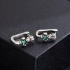 Pendientes de circonita verde con corona popular de estilo hip-hop para mujer, estilo frío, diseño único, hebilla de oreja, accesorios de lujo ligeros de nicho.