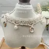 En Stock Encaje de Cinta Estilo Étnico con Lentejuelas de Concha y Abalorios Hecho a Mano Puro Accesorios para Ropa Accesorios para Ropa del Hogar y Sombreros Venta al por Mayor