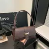 Bolso tejido de PU de moda para mujer, nuevo estilo 2026, bolso de hombro de moda, bolso de hombro simple y casual, bolso elegante para el día a día