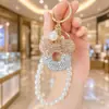 Chaveiro Mickey oco cravejado de diamantes transfronteiriço, corrente de pérolas de alta qualidade, pingente de celular totalmente cravejado de diamantes, pingente de bolsa moderno, presente