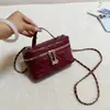 2026 bolso de hombro cruzado casual de moda diseño de nicho bolsa cuadrada pequeña texturizada otoño nuevo elegante bolso para mujer