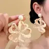 Pendientes de Flor Tejida de Rafia Aguja de Plata Estilo Vacaciones en la Costa Pendientes Exquisitos Pendientes de Alta Gama con un Diseño Único