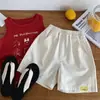 Pantalones cortos de verano finos para niños 2026 nuevo modelo pantalones casuales hasta la rodilla para niños ropa de verano para bebés pantalones de longitud media para niños