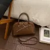Bolso Pequeño Retro de Gama Alta para Mujer 2026 Nuevo Super Popular Versátil Bolso Cruzado de Hombro a la Moda Bolso de Mano Tipo Concha
