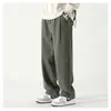 Pantalones casuales rectos de primavera, nuevos pantalones anchos sencillos de color liso para hombre, pantalones largos holgados y a la moda que combinan con todo.