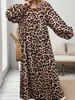 Comercio exterior transfronterizo europeo y americano talla grande otoño 2026 nuevo elegante vestido de longitud media con cuello redondo y estampado de leopardo