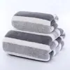 Traje de toalla de baño de forro polar ancho de generación transfronteriza toalla absorbente súper regalo toalla comercio exterior