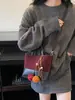 Bolso de Cubo Retro Simple Elegante Casual para Mujer Textura Diseño Nicho Bolso de Hombro Otoño e Invierno 2025 Bolso Cruzado