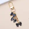 Llavero de Lazo, Colgante para Mochila Escolar de Niña, Llavero de Coche, Pequeño Regalo para Mejor Amiga, Bolsas Pequeñas Culturales y Creativas