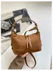 Bolsas Transfronterizas para Mujer 2026 Nuevo Estilo Celebridad de Internet Retro Gamuza Esmerilada Perezoso Bolso de Hombro Único Bolso Cruzado Bolso de Mano de Moda