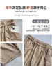 Pantalones de trabajo retro estilo coreano de pierna ancha con bolsillos grandes, de cintura alta, corte holgado, adelgazantes, casuales y relajados, con cordón y bajo abombado, perfectos para otoño