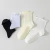 Calcetines de encaje para mujer, de color liso con volantes, estilo japonés, para todas las estaciones, casual, versátiles, hasta la mitad de la pantorrilla, calcetines JK, mocasines Mary Jane