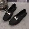 Mocassins de metal com fivela e strass, mocassins de sola plana, sapatos casuais de sola macia, sapatos de couro slip-on para o trabalho feminino de comércio exterior CN