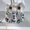 Europeu e americano retro leopardo impressão tecido enrolamento círculo aço agulha brincos personalidade geométrica temperamento alto sentido brincos mulheres atacado