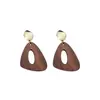 Pendientes redondos geométricos de madera con pasador de plata de estilo étnico retro, ganchos para orejas de diseño único, pendientes de moda y versátiles