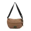 Bolsa Transversal Casual Estilo Japonês para Mulheres 2025 Nova Cor Sólida Bolsa Dumpling Moda Estudante Universitária Bolsa de Ombro Feminina
