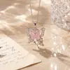 Colar de borboleta popular transfronteiriço para mulheres, pingente de cobre com zircônia embutida de luxo discreto, joia de corrente para clavícula versátil de estilo doce atacado
