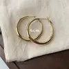 Aguja de Plata Metal Gosmático Superficie Redonda Pendientes de Anillo Sencillos Pendientes de Moda Sencillos Pendientes Elegantes Sentido del Diseño Nicho