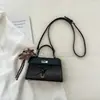 Bolso de diseñador de nicho para mujer, nuevo bolso cruzado versátil vintage de otoño 2026, bolso de mano súper popular, bolso Kelly