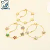 Pulsera de moda de margarita transfronteriza, lujo ligero con un toque de alta gama, flor de cinco pétalos con incrustaciones de diamantes de colores, joyería de acero inoxidable para mujer