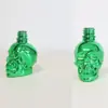 Superventas transfronterizo en stock: varios colores de botellas de perfume al por mayor con forma de calavera de 30 ml, botellas de cáñamo, botellas pequeñas de aceites esenciales, vidrio para manualidades