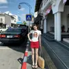Camiseta Feminina Manga Curta Gola Redonda Estampa Little Jade Ombro Normal Verão 2026 Nova Básica Versátil Modeladora Top Coreano