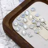Dongzhou Cristal Nieve Proteína Arte de Uñas Diamante Brillante Blanco Proteína Huevo de Paloma Fondo Puntiagudo Diamante Dongzhou Diamante Wholesale Accesorios para Arte de Uñas