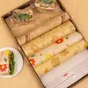 Papel a prueba de grasa para alimentos en stock, papel para empaque de hamburguesas, pollo frito y bolas de arroz, fábrica de impresión fuente para catering y comida para llevar