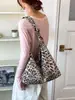Bolso de lona nuevo estilo japonés y coreano con estampado de leopardo para estudiantes mujeres, adecuado para la escuela, bolso cruzado, bolso de hombro de terciopelo simple y versátil