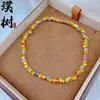 Nuevo diseño estilo chino bañado en oro pulsera de cuentas de piedra ojo de tigre de la fortuna para mujer, pequeño pez amarillo calabaza pulsera versátil venta al por mayor