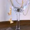 Nueva cadena de clavícula de lujo estilo coreano, collar versátil de acero de titanio de moda para mujer, colgante simple clásico de circón, accesorio versátil