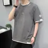 Camiseta de Color Sólido Falsa de Dos Piezas de Manga Corta para Hombre 2023 Verano Nueva Moda Holgada Casual Camiseta Tendencia Camisa Base Tendencia