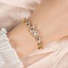 Pulseira de pérolas de nicho de luxo leve estilo japonês e coreano para mulheres atacado design de alto nível pulseira de flor de zircônia versátil joias